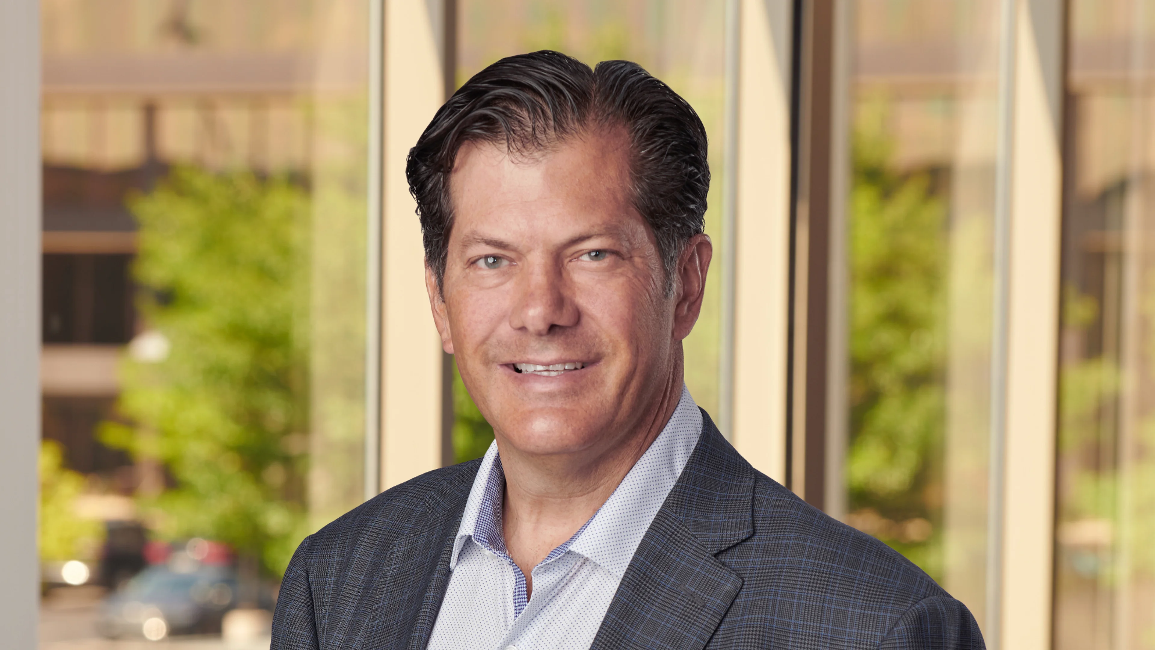 Professional headshot of Chad Anschuetz.