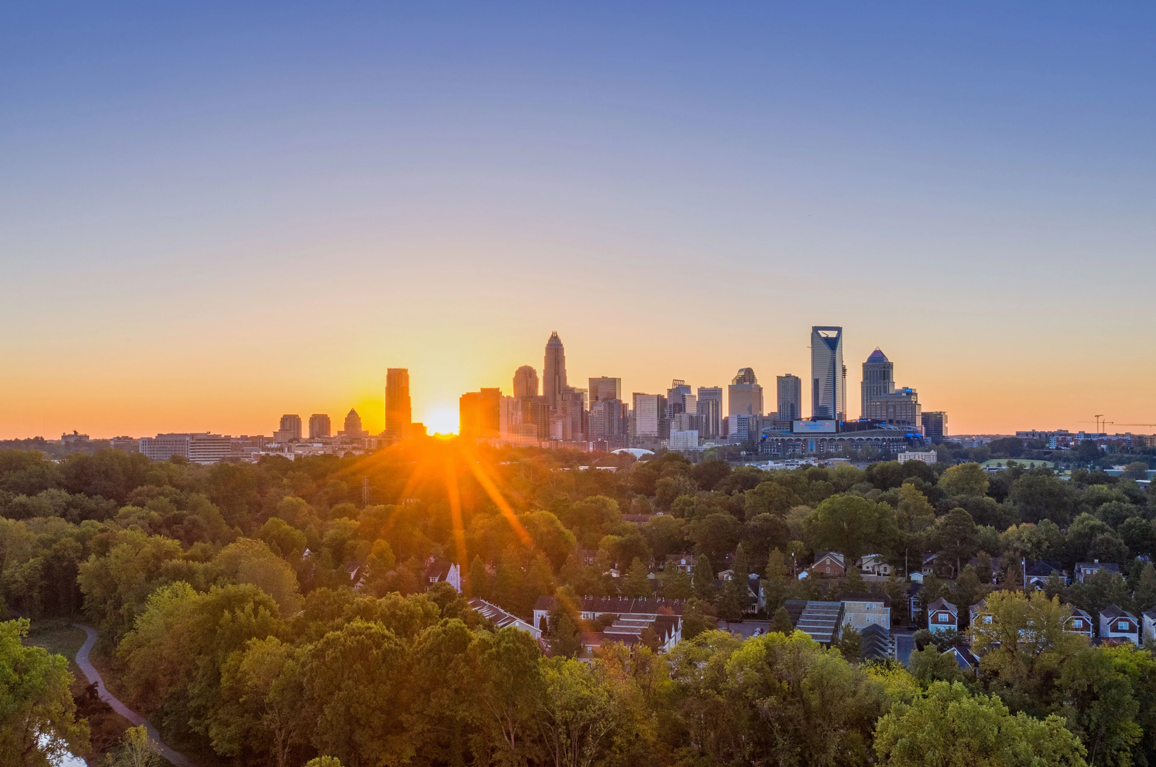 A distant view of a skyline during sunset in Charlotte, North Carolina, United States