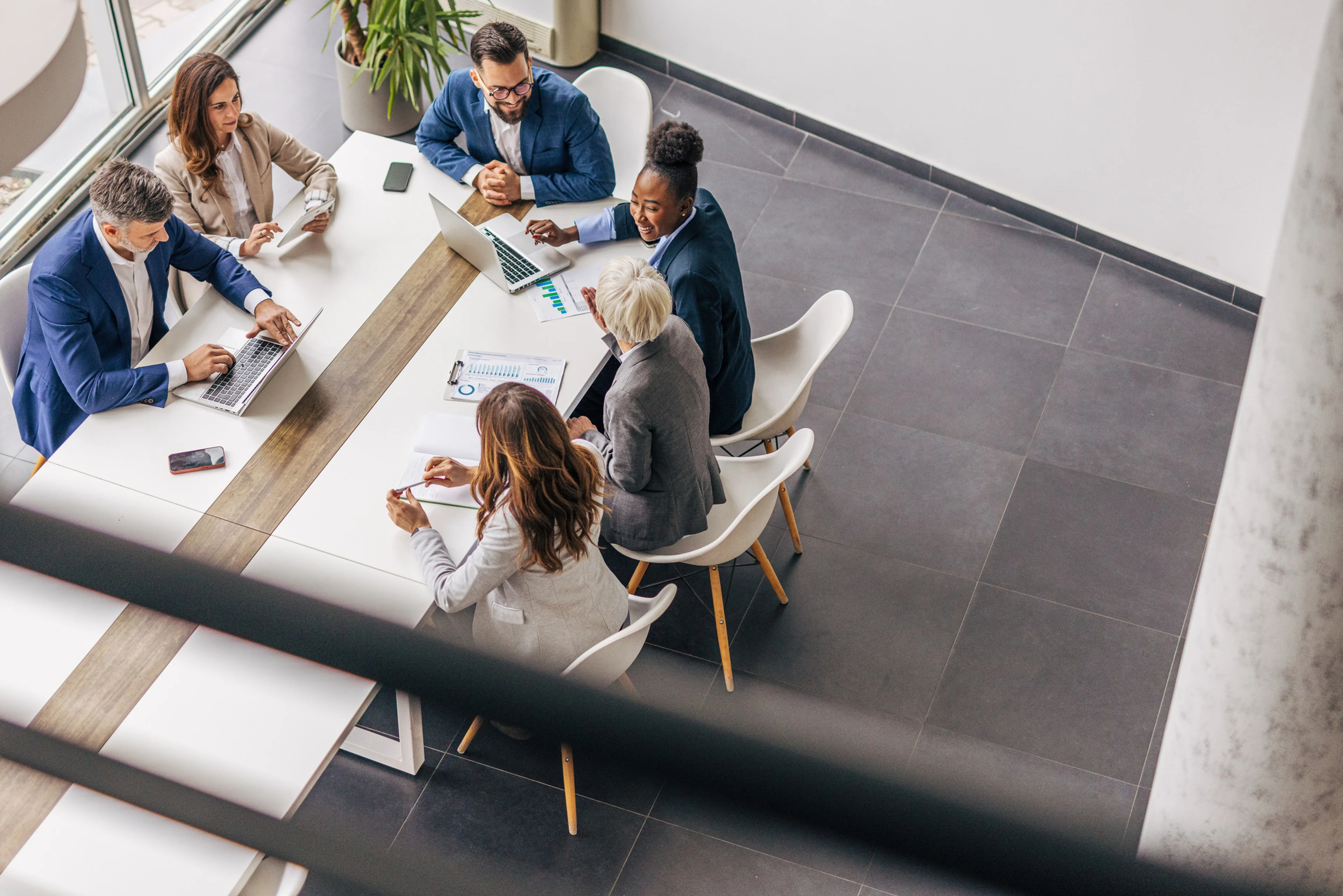A group of business professionals having a meeting.