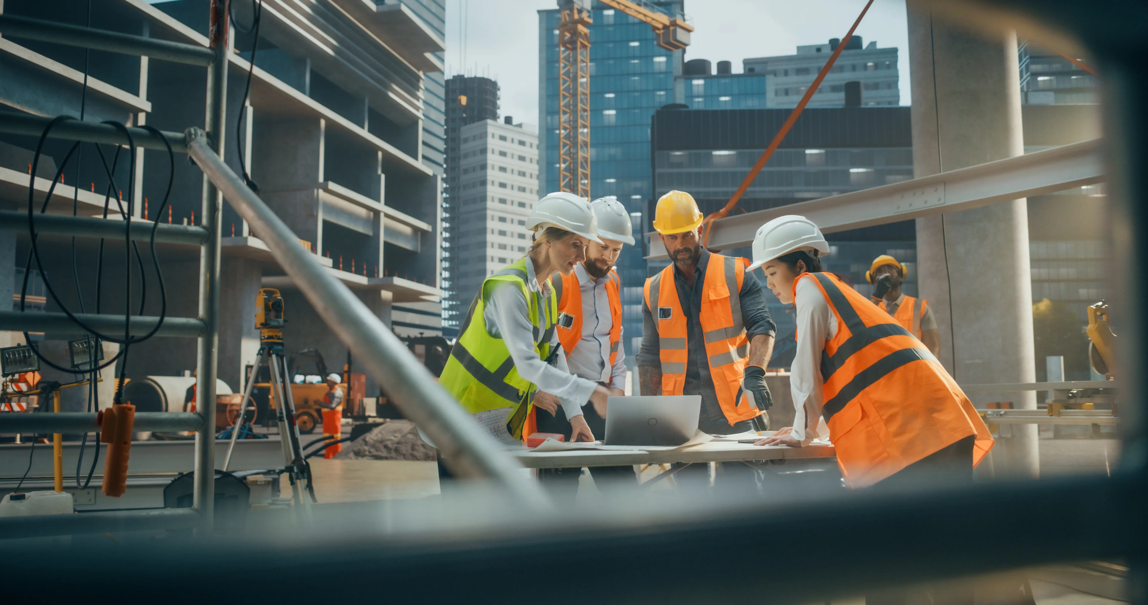 Construction workers working together at a worksite.