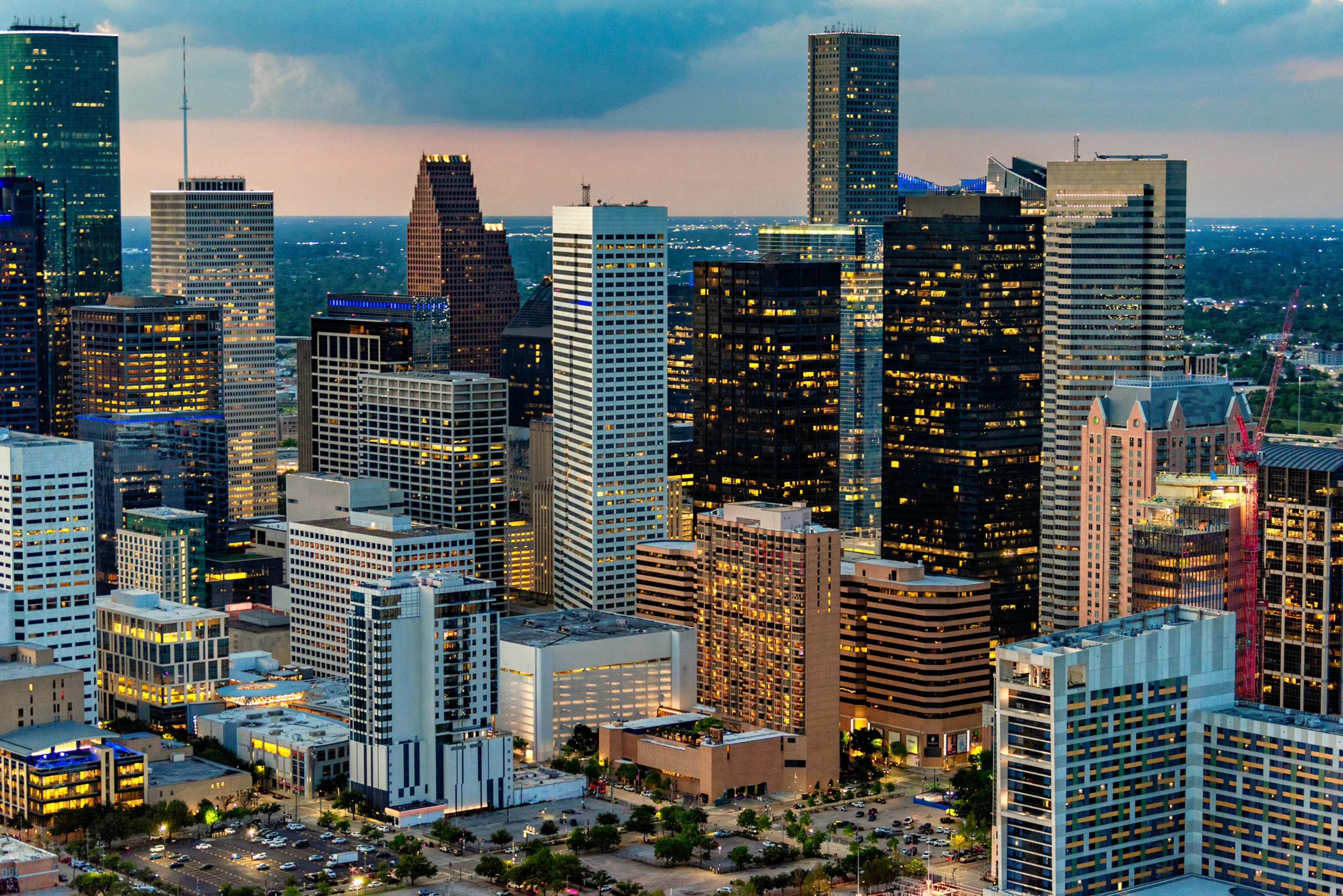 The skyline of Downtown Houston at dusk.