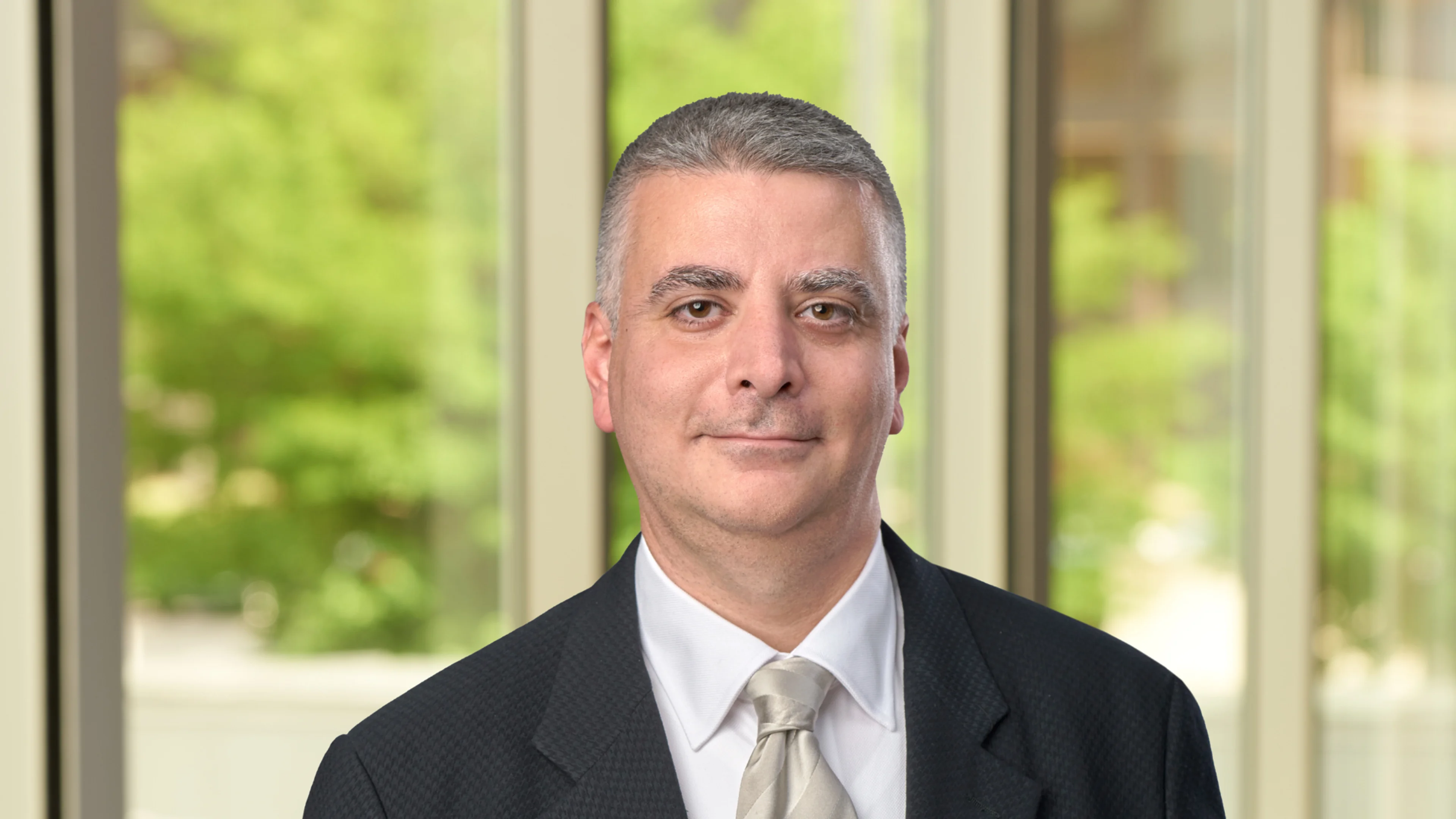 Professional headshot of Joe Akouri.