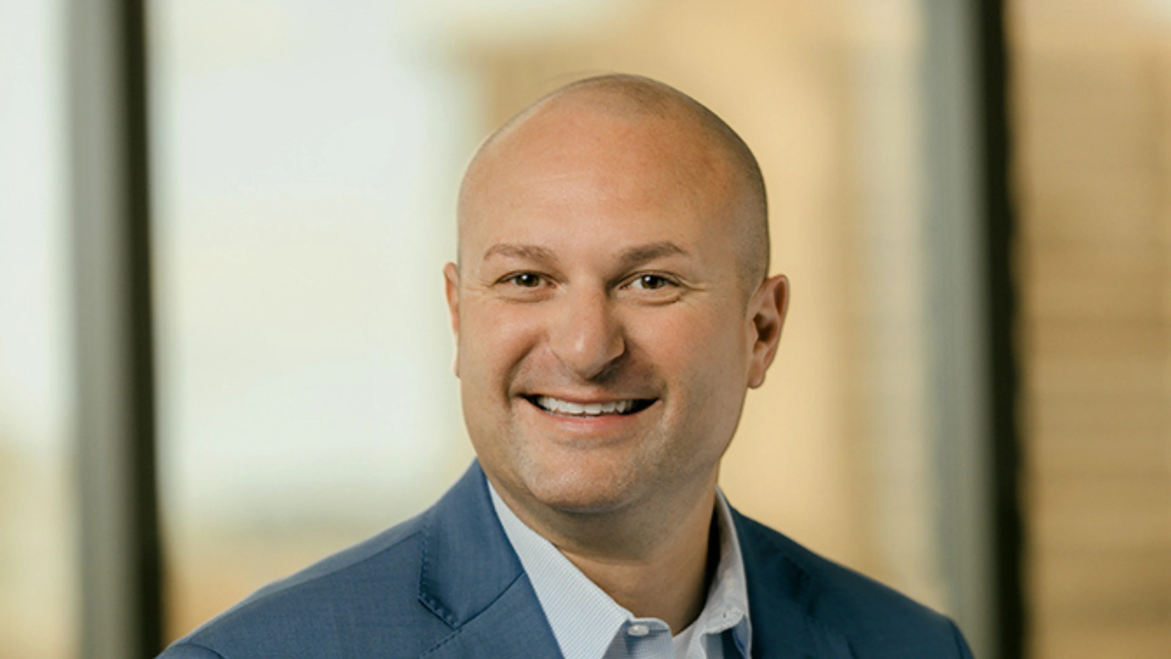 Professional headshot of John Garvey.