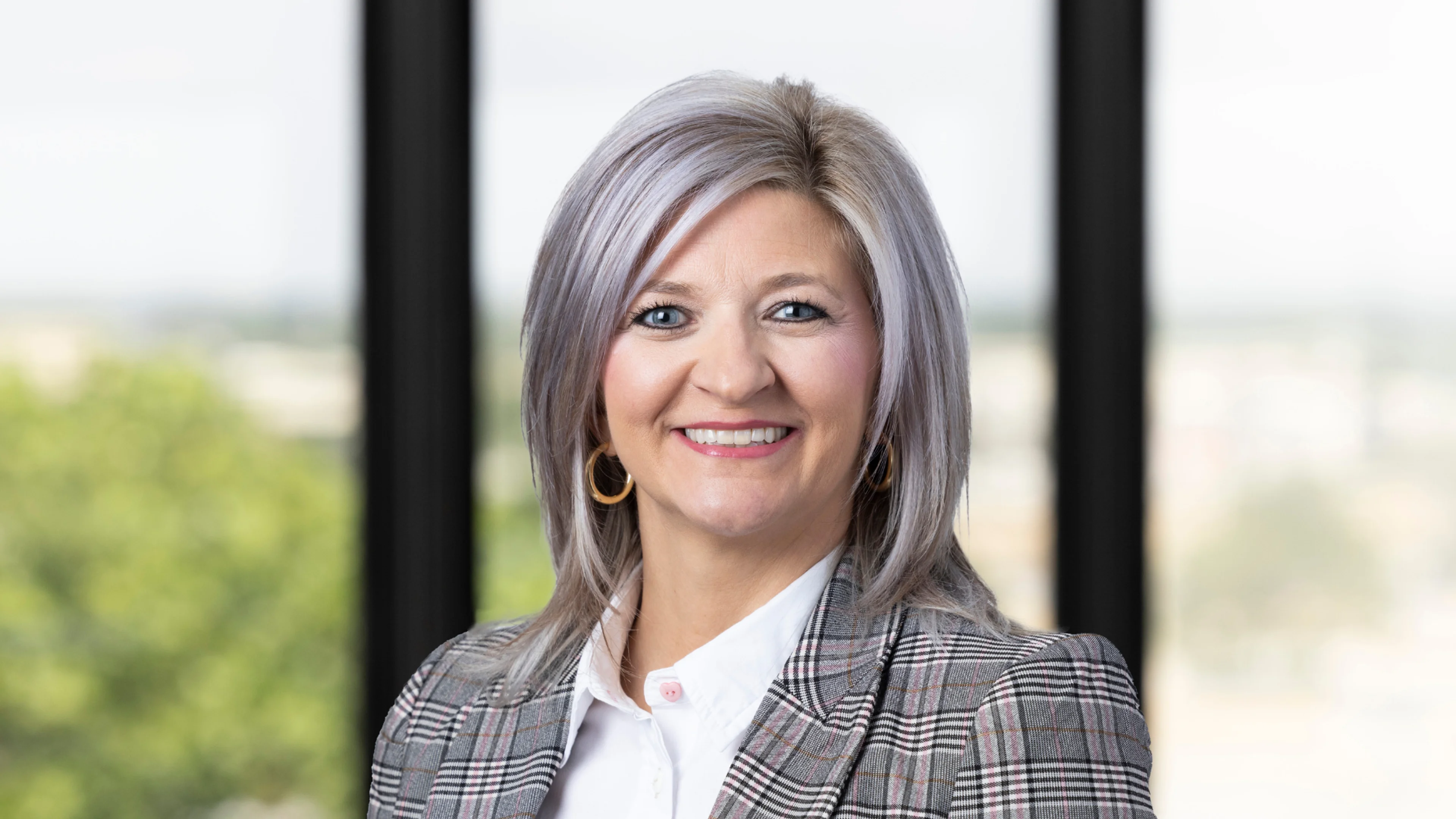 Professional headshot of Kendra Pope.