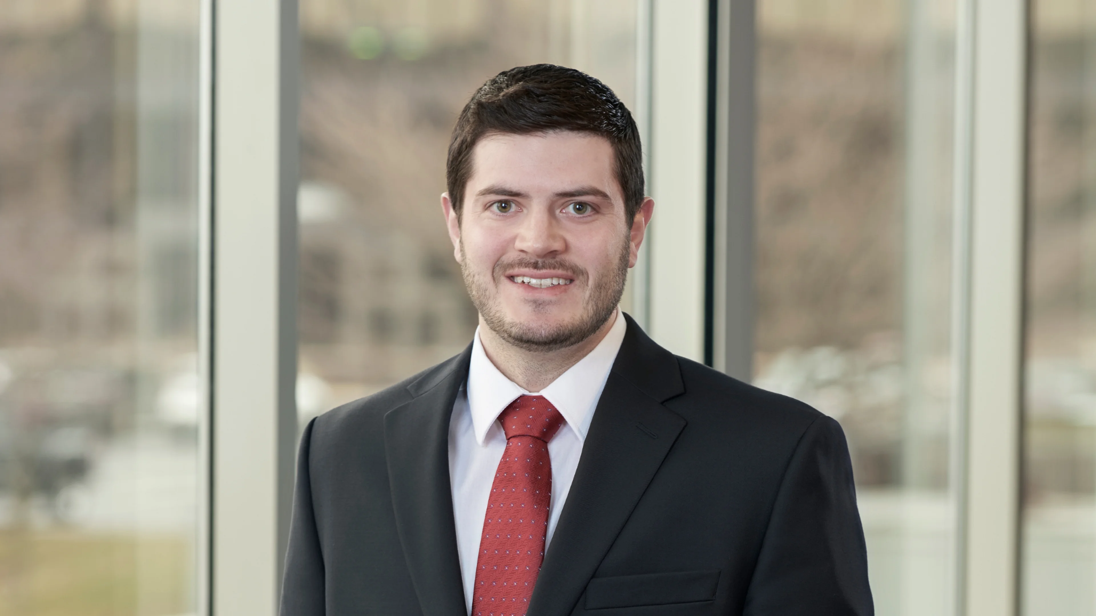 Professional headshot of Ryan Mckeon.